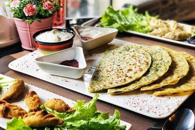 Azerbaijani Cuisine Tour - Choosing starters and mains at a local restaurant