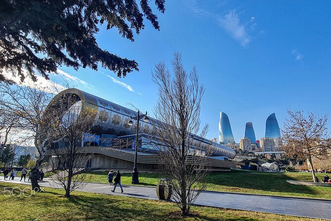 Baku City Sights Guided Night Walking Tour with Funicular - Returning through central Baku’s grand buildings