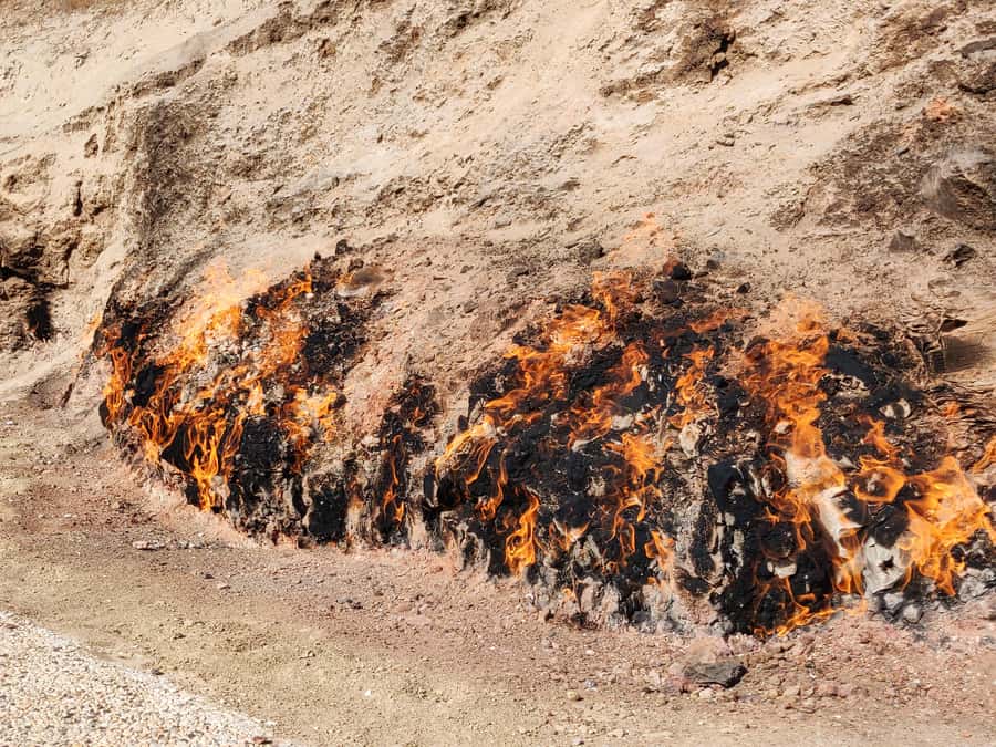Baku: Gobustan, Mud Volcanoes, Ateshgah, and Yanardag Tour - Reading 6,000 rock drawings among the Gobustan hills