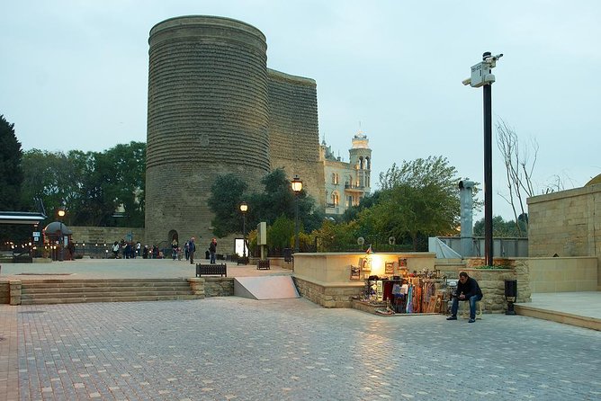 Baku Old City Tour (officially by Old City Tours) - Walking past the Ismailliya building and Ali Shamsi’s workshop