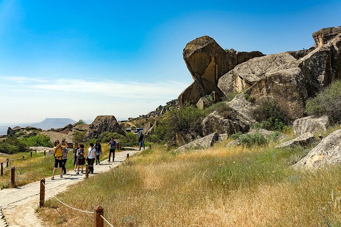 Discover Gobustan and Absheron History, Mud Volcanoes and Nature - Yanar Dag: fire on the hillside