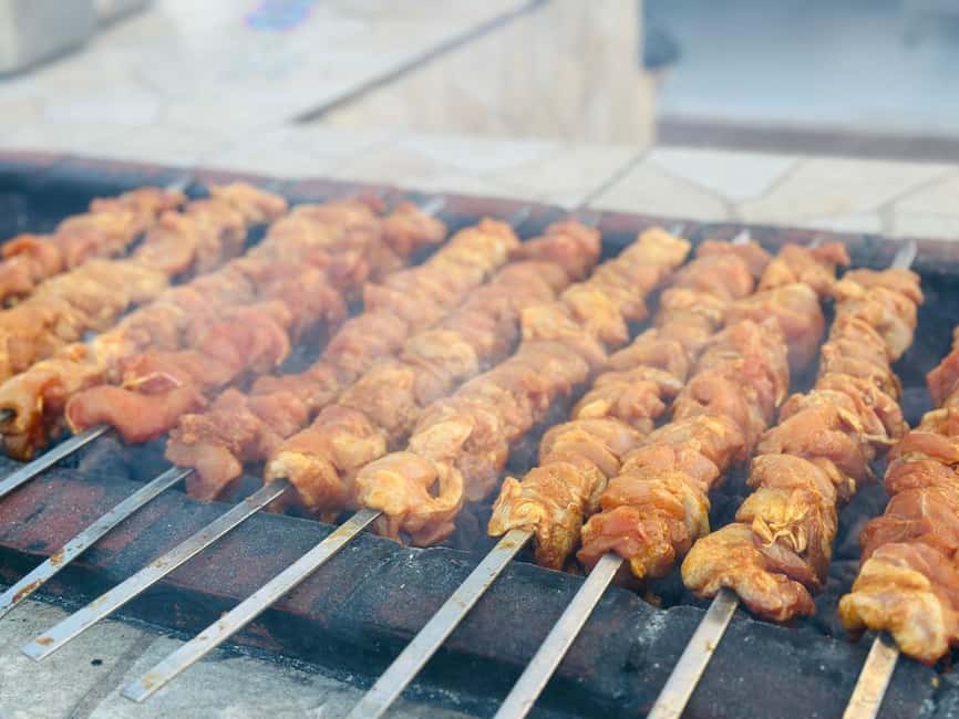 Dubai: Desert Safari, Camel Ride, Quad Bike & BBQ Dinner - Fire, Tanoura, belly dance, and folk performance