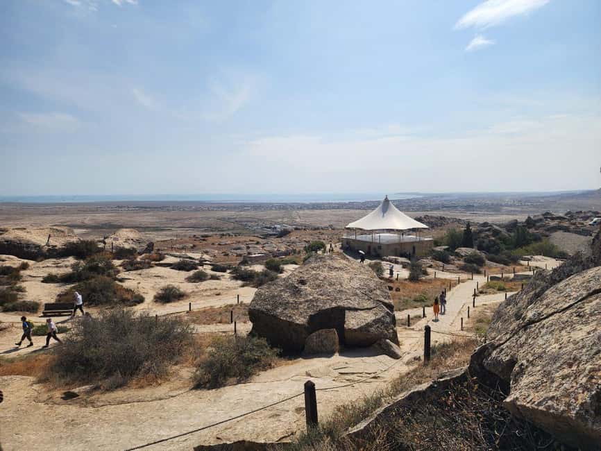 From Baku: Gobustan Rock Art and Mud Volcanoes Tour - What the guides add to the day